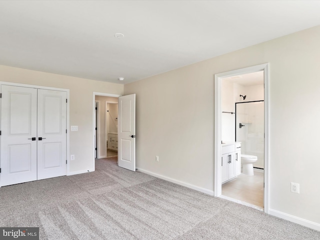 118 Pawn Ct, Winchester, VA 22602 - unfurnished bedroom featuring light colored carpet, baseboards, and ensuite bath