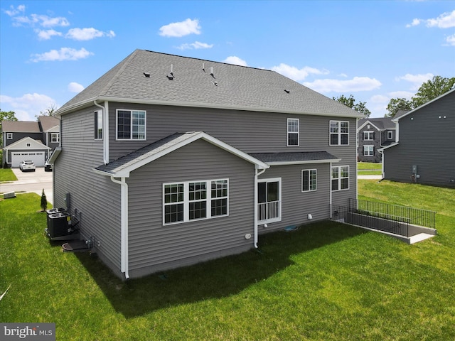 118 Pawn Ct, Winchester, VA 22602 - rear view of house featuring a lawn, central air condition unit, and roof with shingles