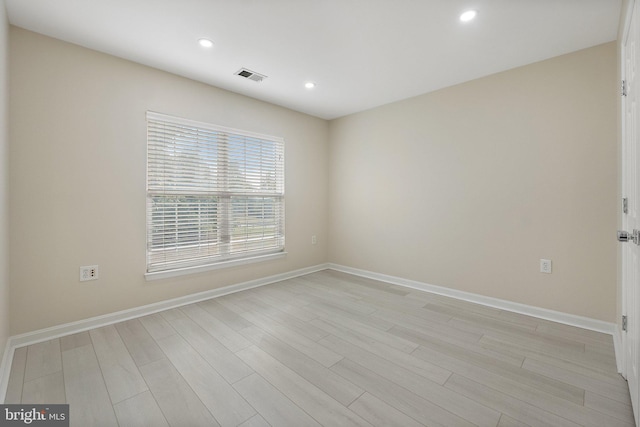 empty room featuring light wood-type flooring