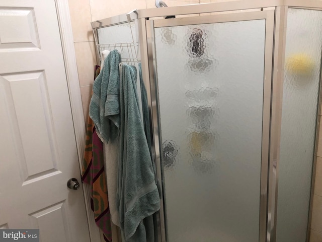 bathroom with an enclosed shower