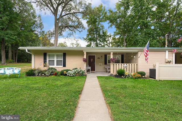 view of front of home with a front lawn