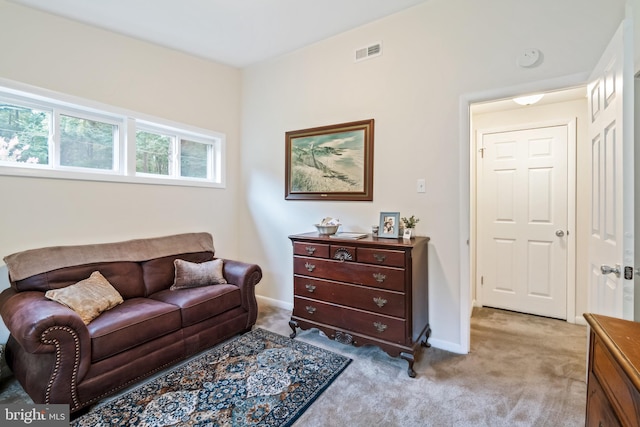 living room with light carpet