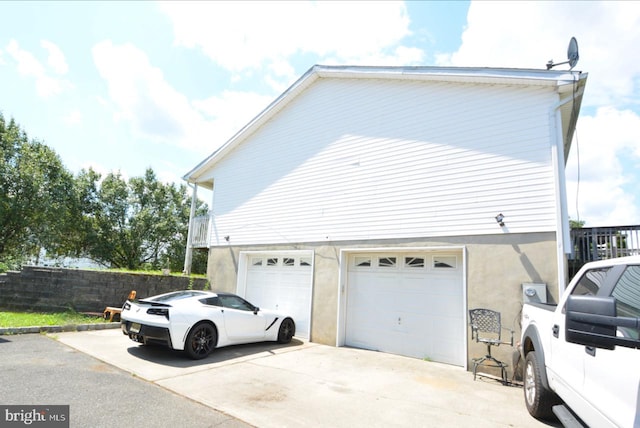 view of home's exterior with a garage