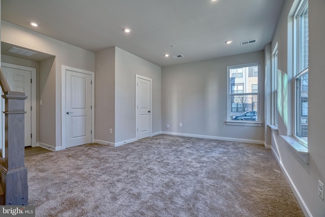 view of carpeted spare room