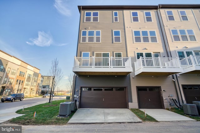 multi unit property with a balcony and cooling unit