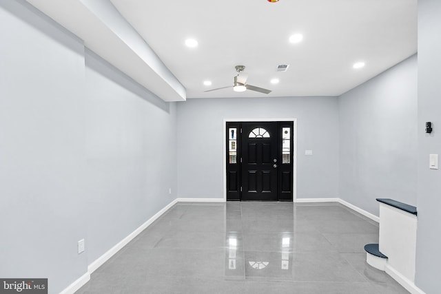 entrance foyer featuring ceiling fan