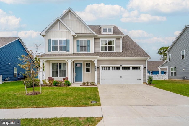 craftsman-style home with a front lawn, covered porch, and a garage