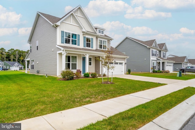 view of front of house featuring a front lawn and a garage