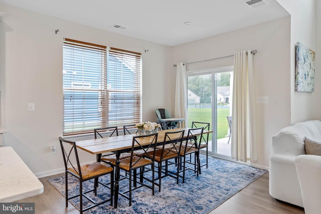 dining room featuring light hardwood / wood-style floors