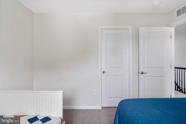 bedroom featuring carpet flooring