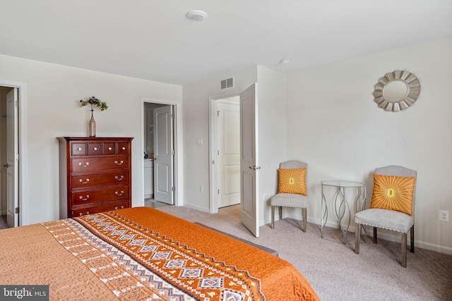 bedroom featuring light carpet