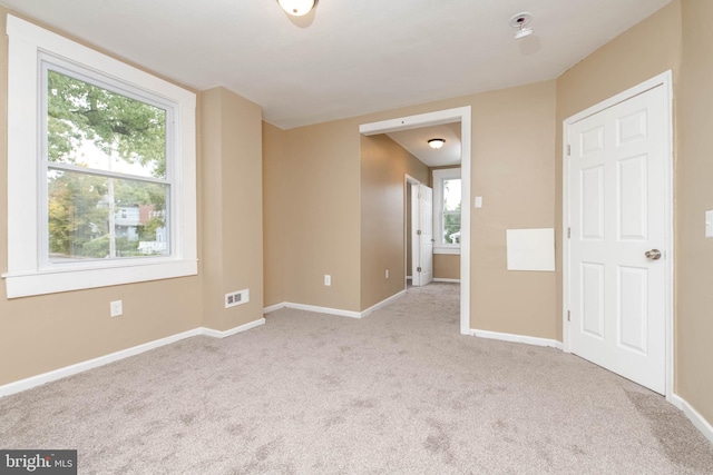 view of carpeted spare room