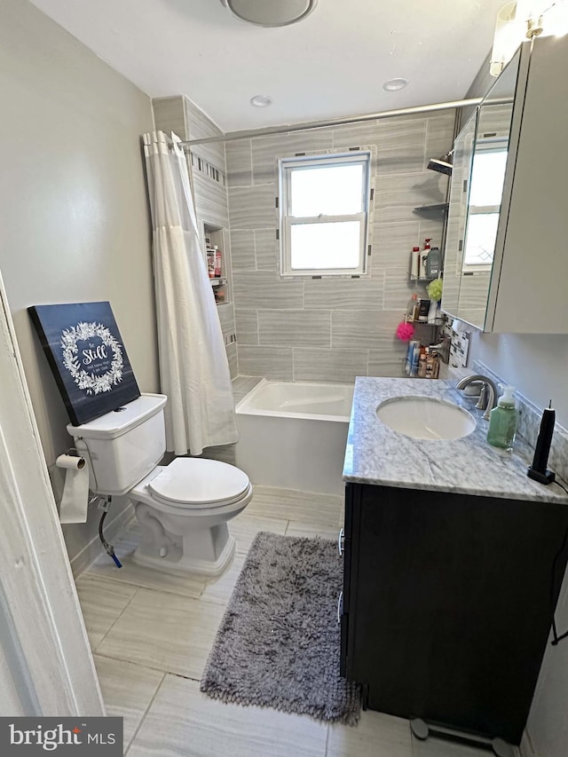 full bathroom with vanity, toilet, and shower / bathtub combination with curtain