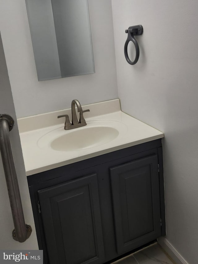 bathroom with vanity and tile patterned floors