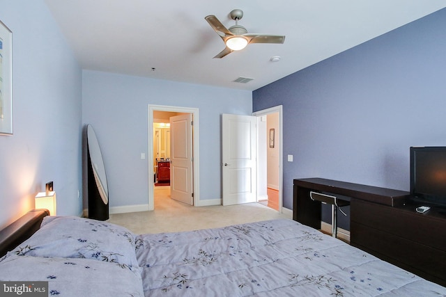 bedroom featuring ceiling fan and light colored carpet