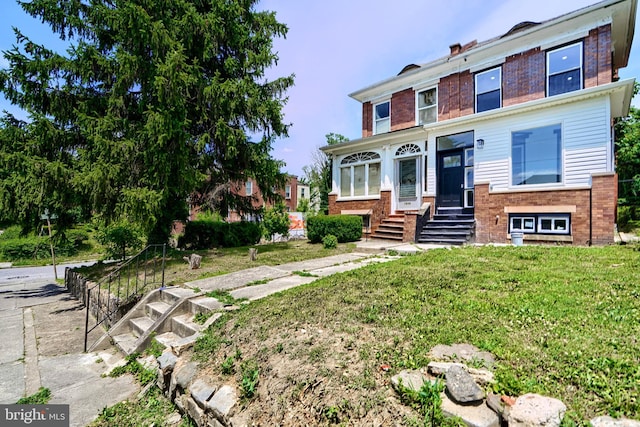 view of front of house featuring a front yard