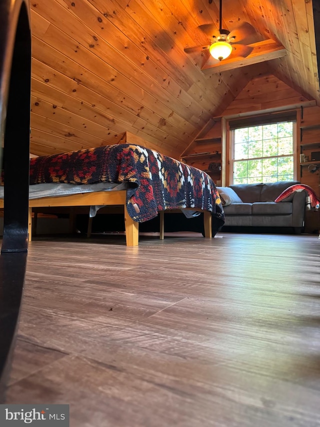 unfurnished bedroom featuring vaulted ceiling, ceiling fan, and wooden ceiling