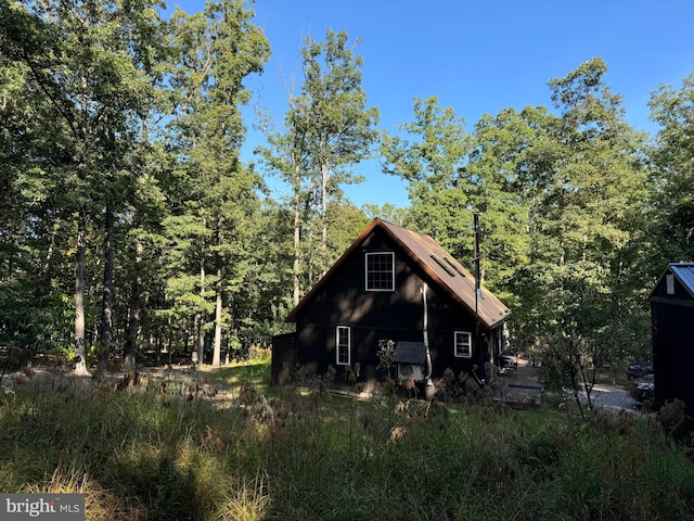 exterior space with an outbuilding