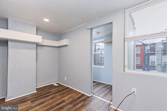 interior space featuring dark hardwood / wood-style flooring