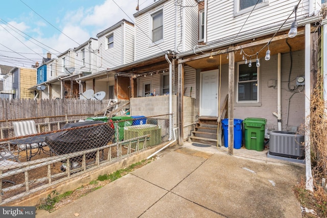 exterior space featuring central AC unit