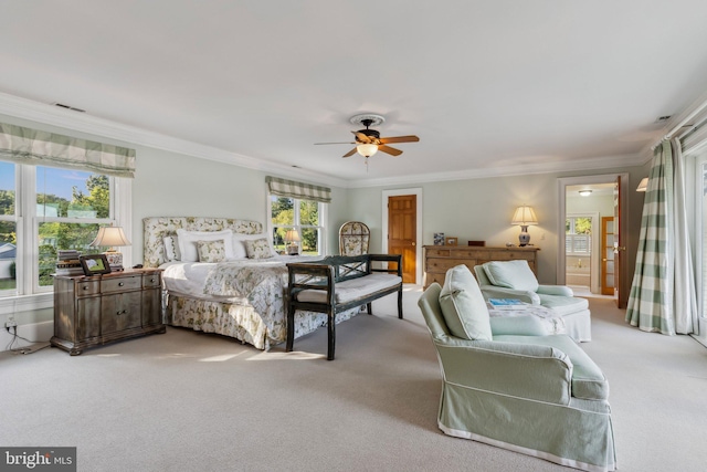 bedroom with ceiling fan, crown molding, and light carpet