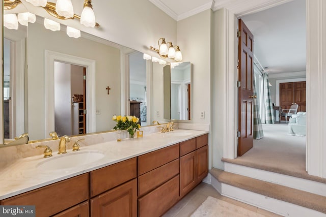 bathroom with vanity and ornamental molding