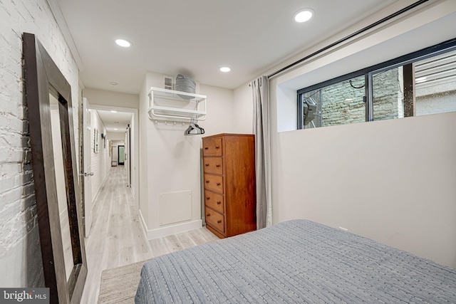 bedroom featuring light hardwood / wood-style floors