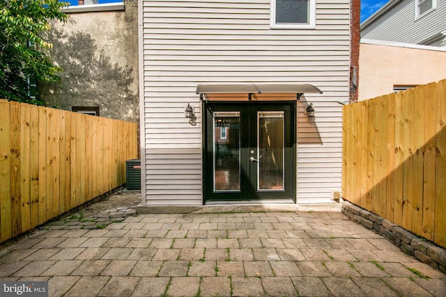 doorway to property with a patio and french doors