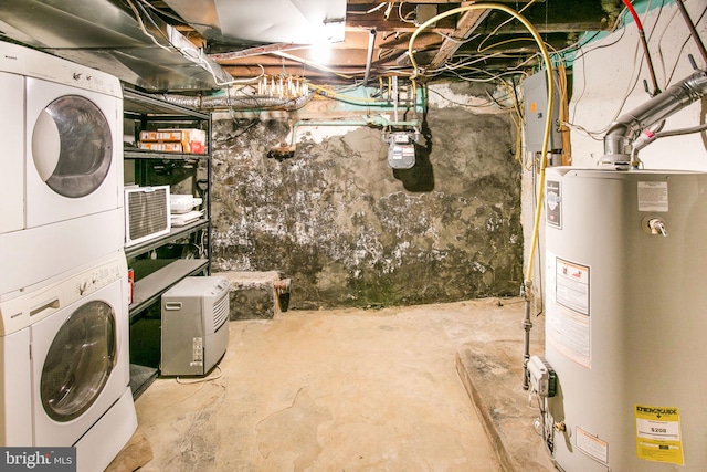 basement with stacked washer and clothes dryer, water heater, and electric panel