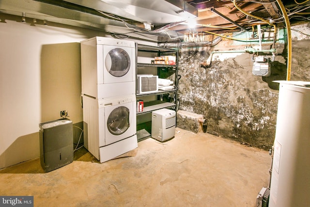 washroom with stacked washer / drying machine