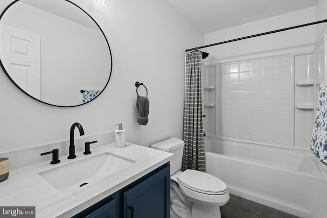 full bathroom with vanity, shower / tub combo, and toilet