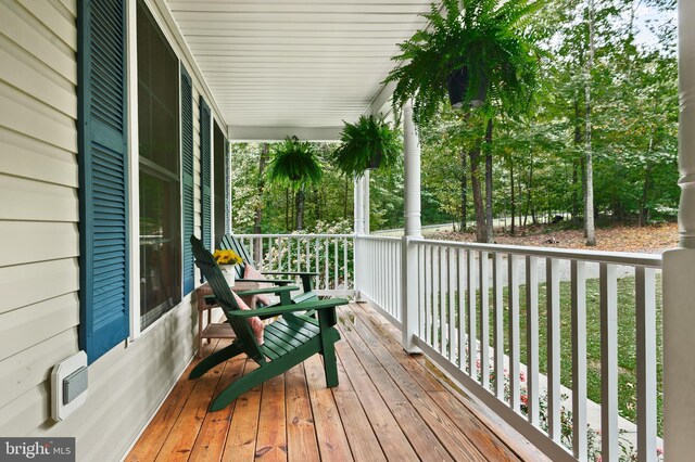 wooden deck with a porch