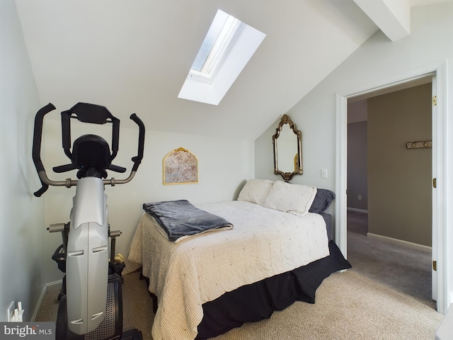 bedroom with carpet and lofted ceiling with skylight