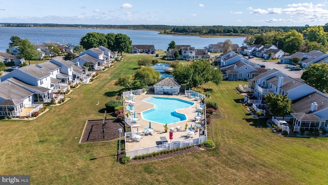 birds eye view of property featuring a water view