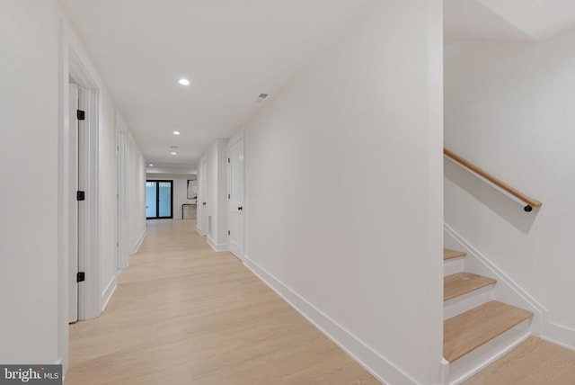 hallway featuring light hardwood / wood-style floors