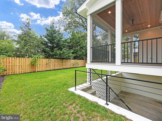 view of yard featuring a sunroom