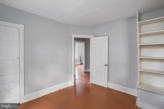 interior space featuring dark wood-type flooring