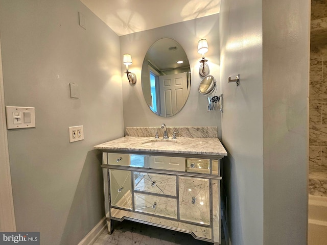 1080 Wisconsin Ave NW Unit 103/104, Washington, DC 20007 - bathroom featuring vanity, baseboards, and marble finish floor