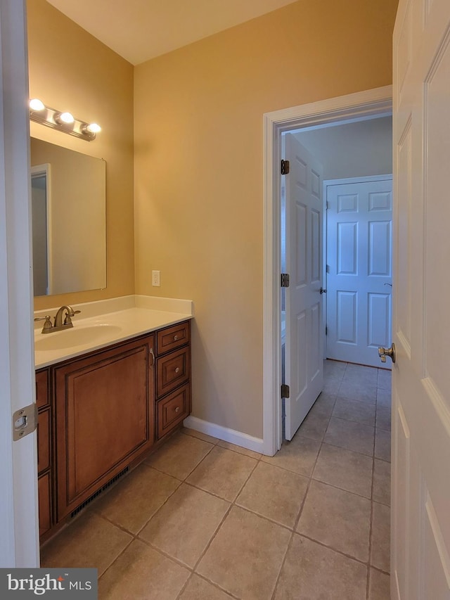 bathroom featuring vanity and tile patterned floors