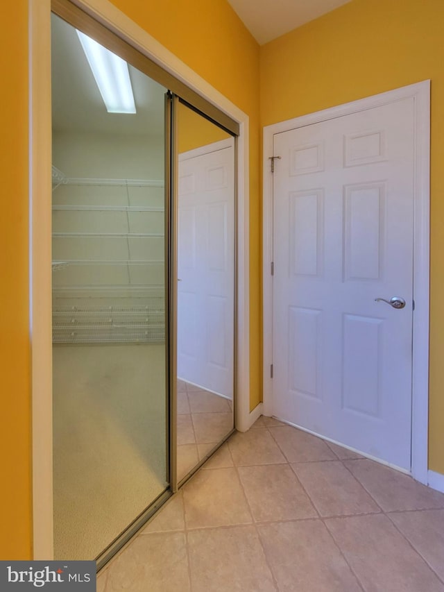 interior space featuring light tile patterned floors