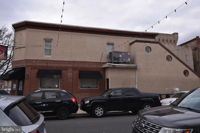 exterior space featuring central air condition unit