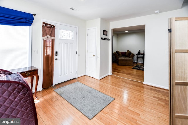 entrance foyer featuring hardwood / wood-style flooring