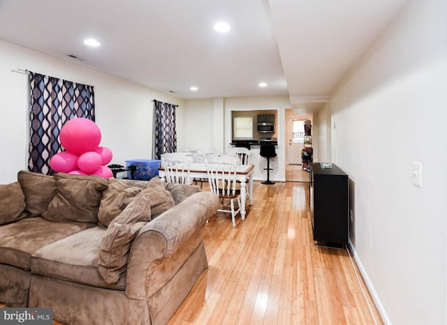 living room featuring light hardwood / wood-style floors