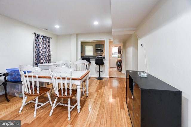 dining room featuring light hardwood / wood-style flooring