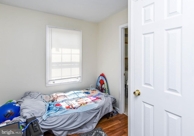 bedroom featuring wood-type flooring