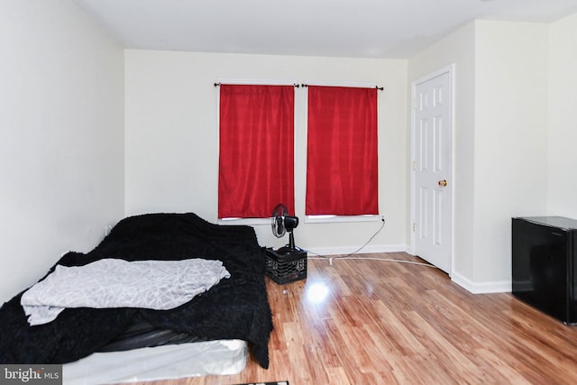 bedroom with light wood-type flooring