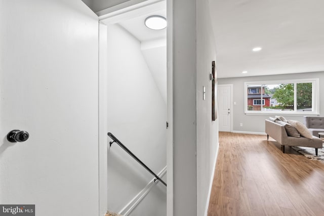 corridor featuring light hardwood / wood-style floors