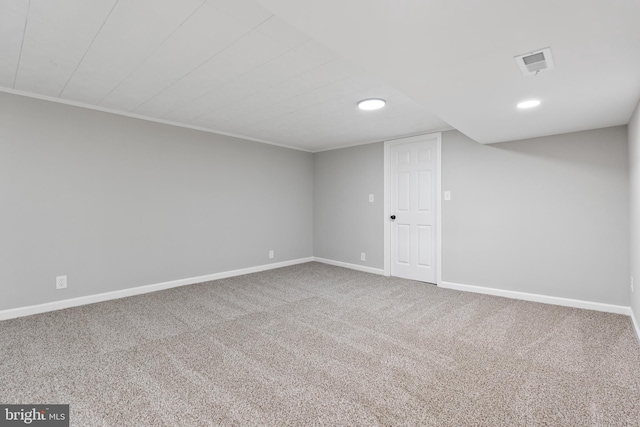 basement with carpet flooring