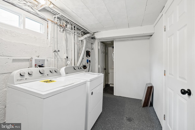 laundry room featuring separate washer and dryer