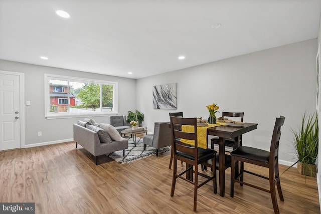 dining room with light hardwood / wood-style floors